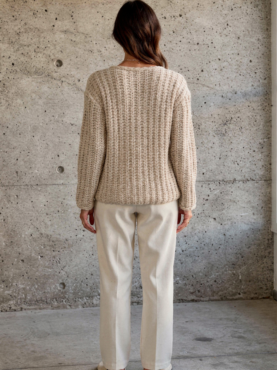 Cream chunky knit cardigan, back view showing the knit texture