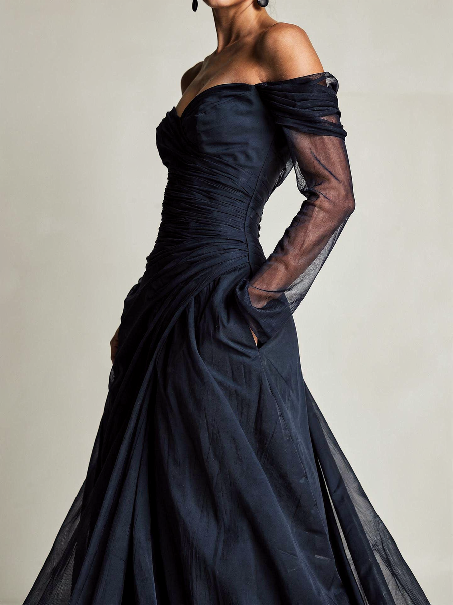 Navy blue off-shoulder chiffon maxi dress, close detail of neckline and sheer sleeves